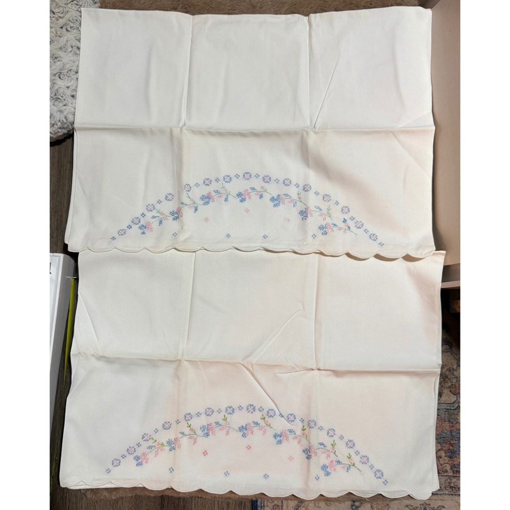 Beautiful blue and pink stitched pair of pillow cases